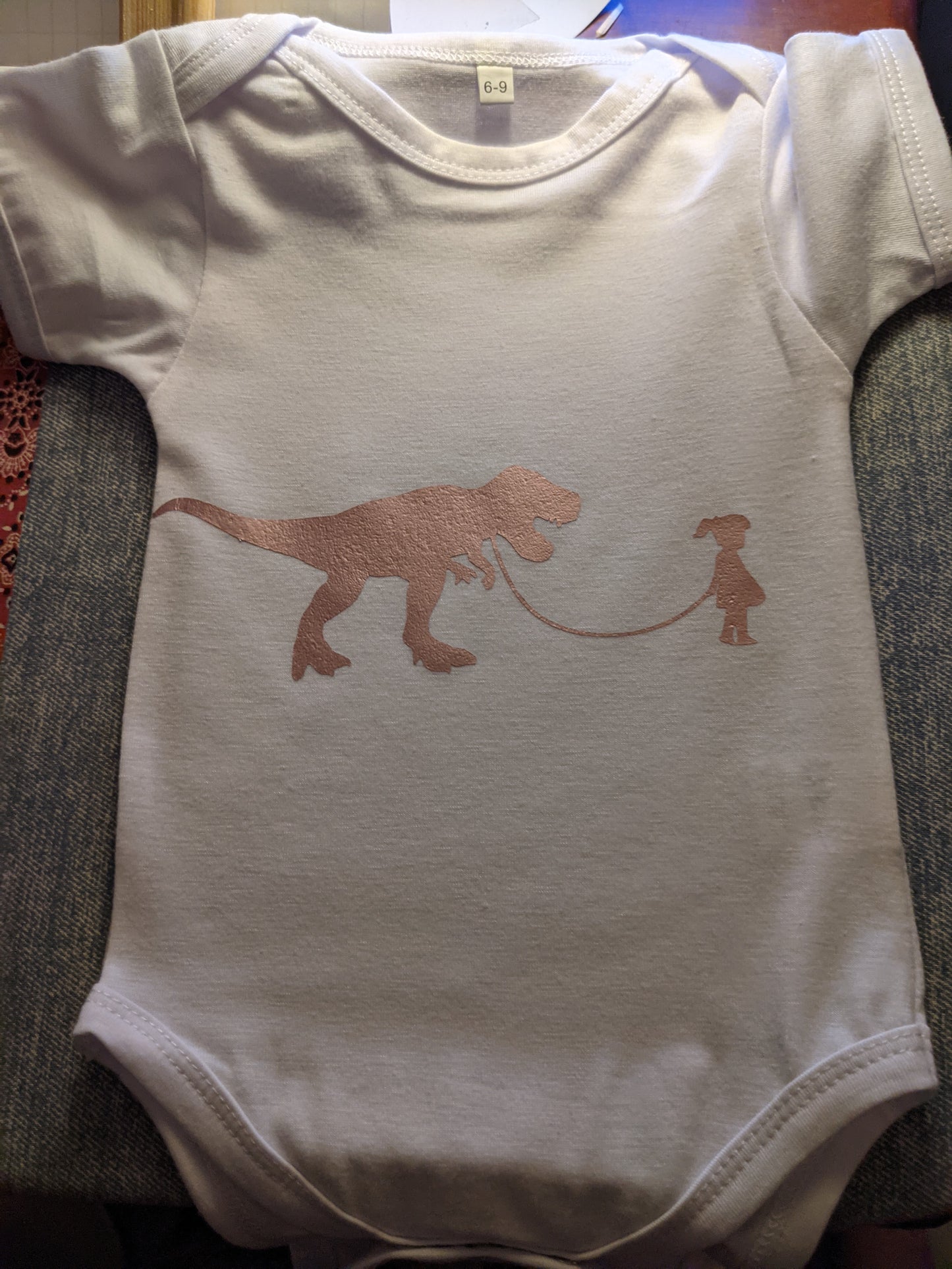 Boy/Girl with Dino Onesie