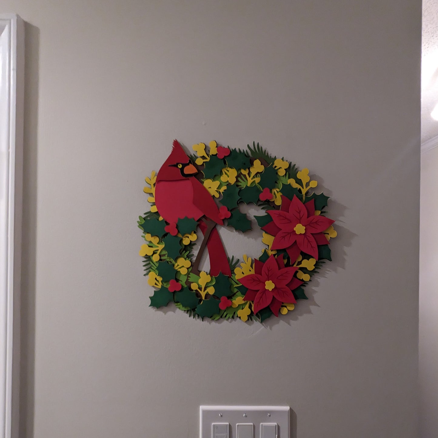 Holiday Elegance: 15-Inch Layered Cardstock Poinsettia Wreath with Festive Avian Accent